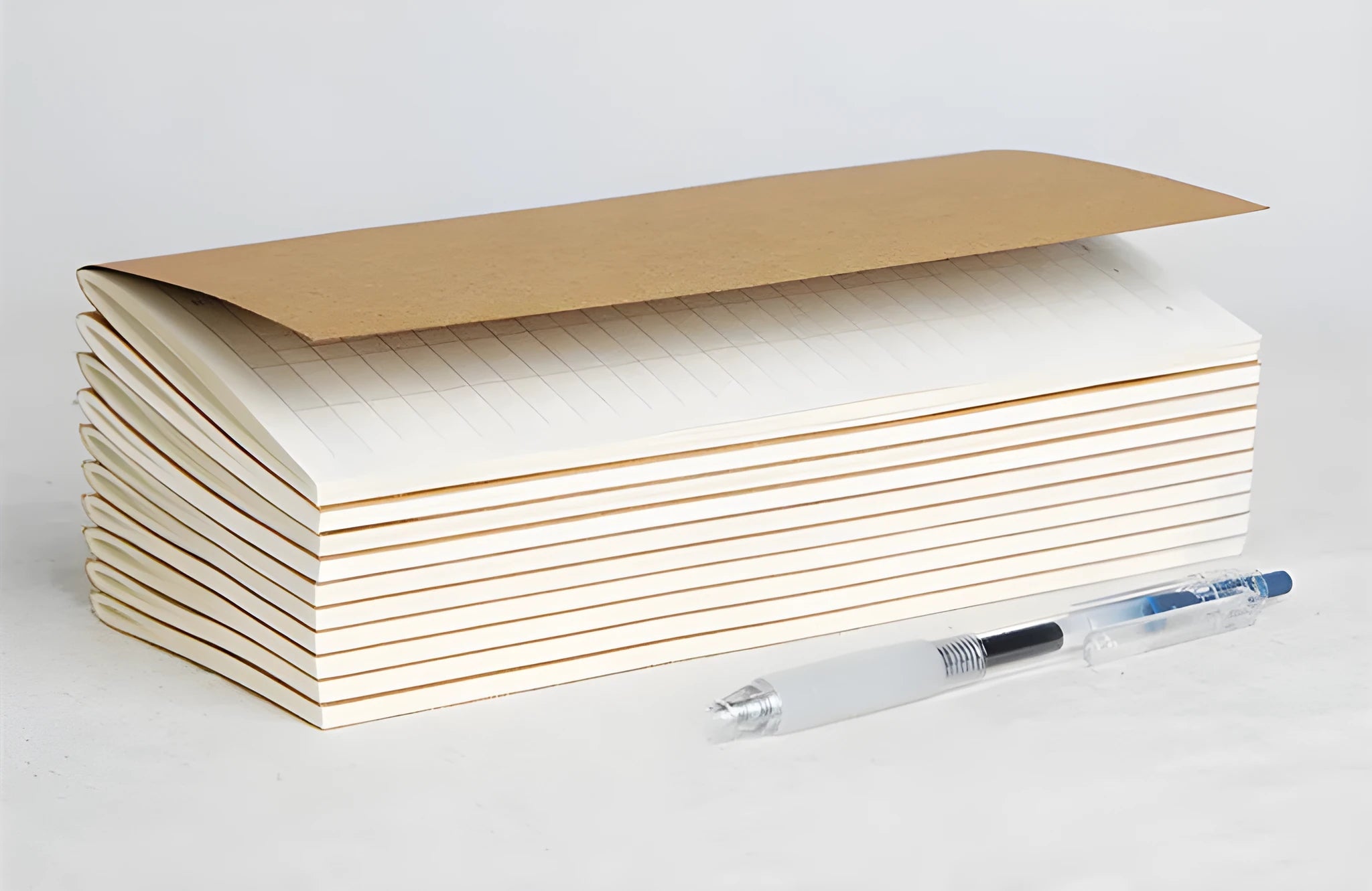 11x21cm cowhide diary refill notebook with saddle stitch binding and ivory white paper pages.