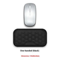 Cowhide keyboard wrist rest with non-slip base on a desk, featuring a black keyboard tray for office typing comfort