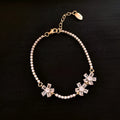 Women's geometric copper bracelet with inlaid zircon in a gold colour