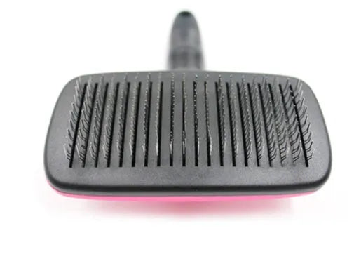 Rose red self-cleaning pet comb with stainless steel teeth and ergonomic handle for removing dog and cat hair