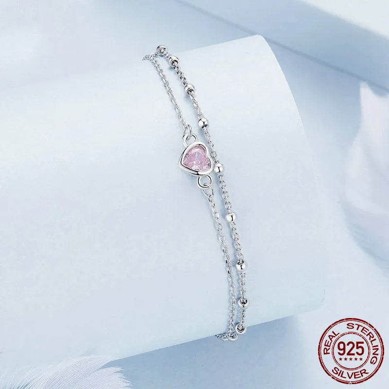 Sweet girlish 925 sterling silver bracelet with heart-shaped pendant on adjustable chain