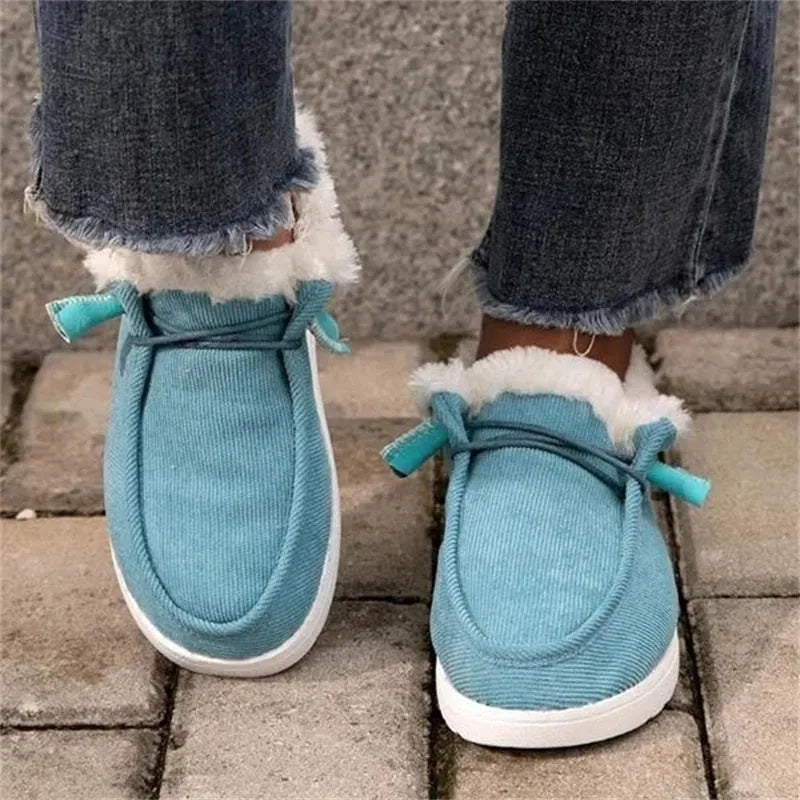 Women's warm plush ankle snow boots with cotton upper cross straps flat heel front tie in black