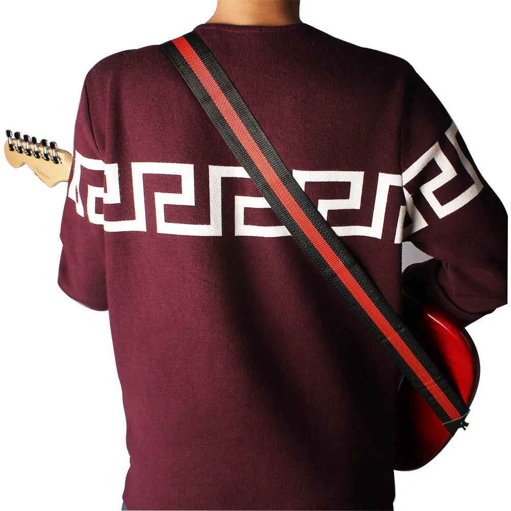 Woven crossbody guitar strap in multiple colours, suitable for bass, electric, acoustic, and ukulele.