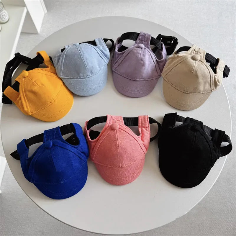 Adjustable cotton pet baseball cap with exposed ears, shown in apricot, blue, milk blue, purple or black
