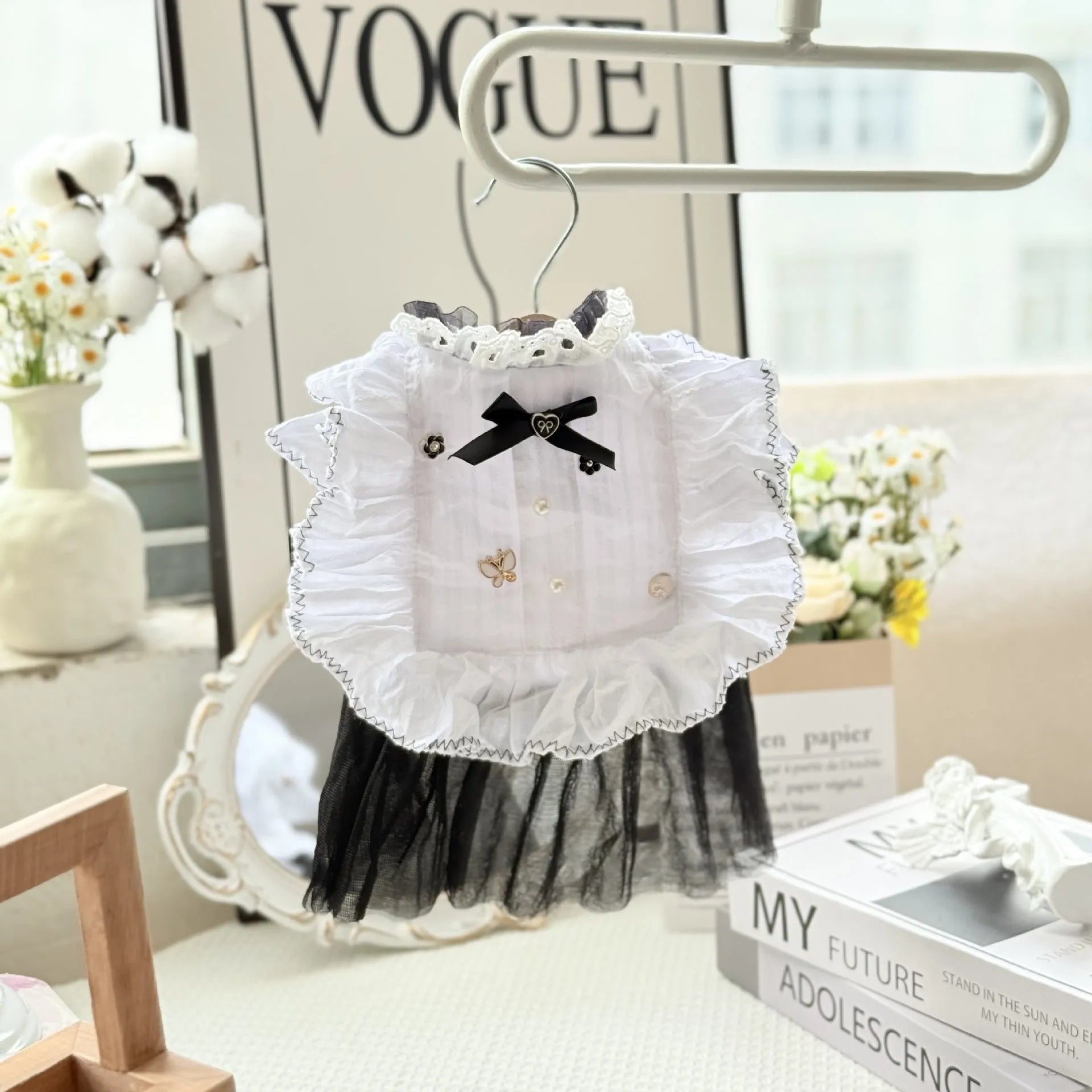 White yarn skirt princess-style dog dress for small dogs, shown on a mannequin.
