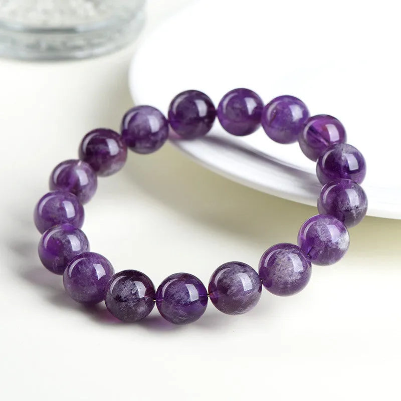 Natural feather Amethyst Snow Mountain purple crystal bracelet with geometric beads and Ruyi element.