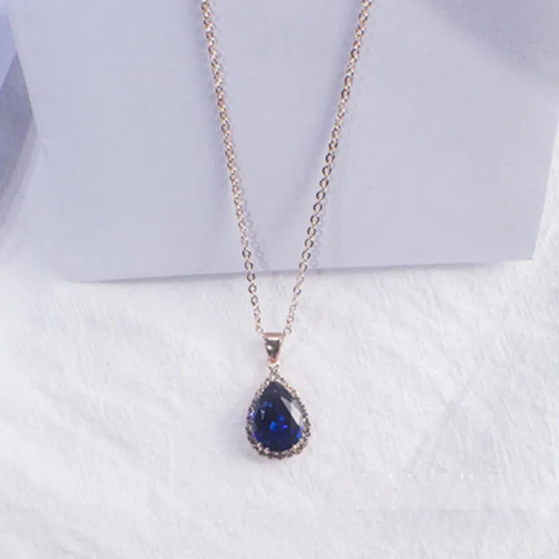 Geometric rhinestone water drop necklace in rose gold electroplated finish