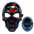 Halloween LED skeleton mask glowing in a dark room with four light modes and visible eye nose mouth cutouts