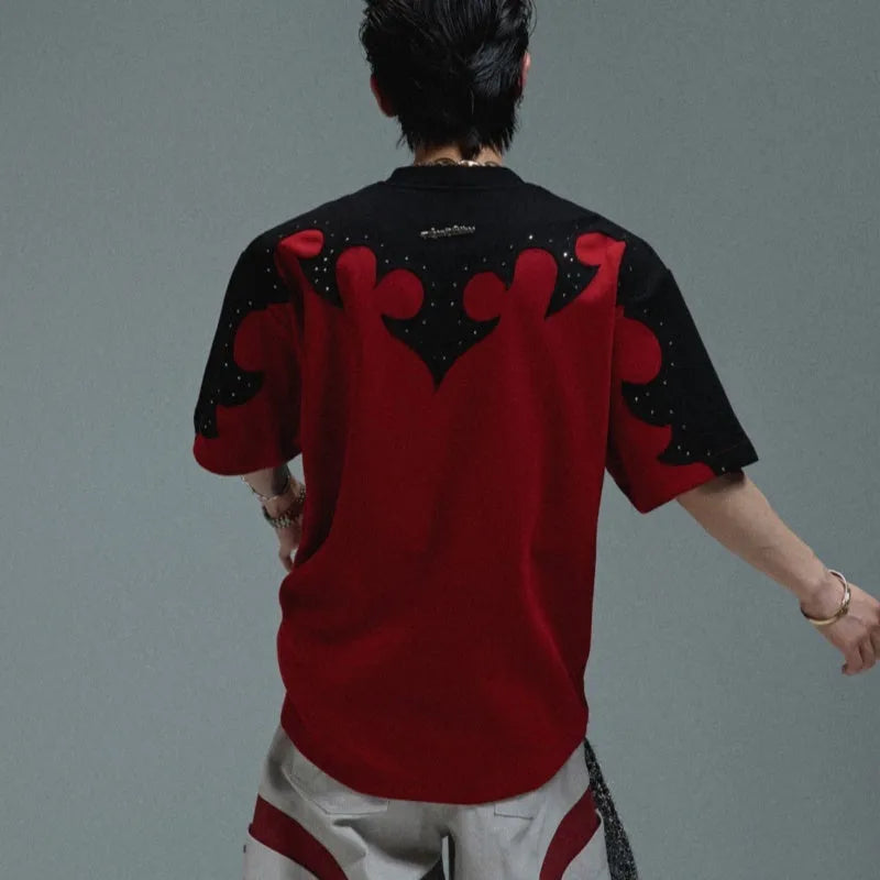 Men's grey loose fit cotton shirt with burnt flower stitching and rhinestone details on the front.