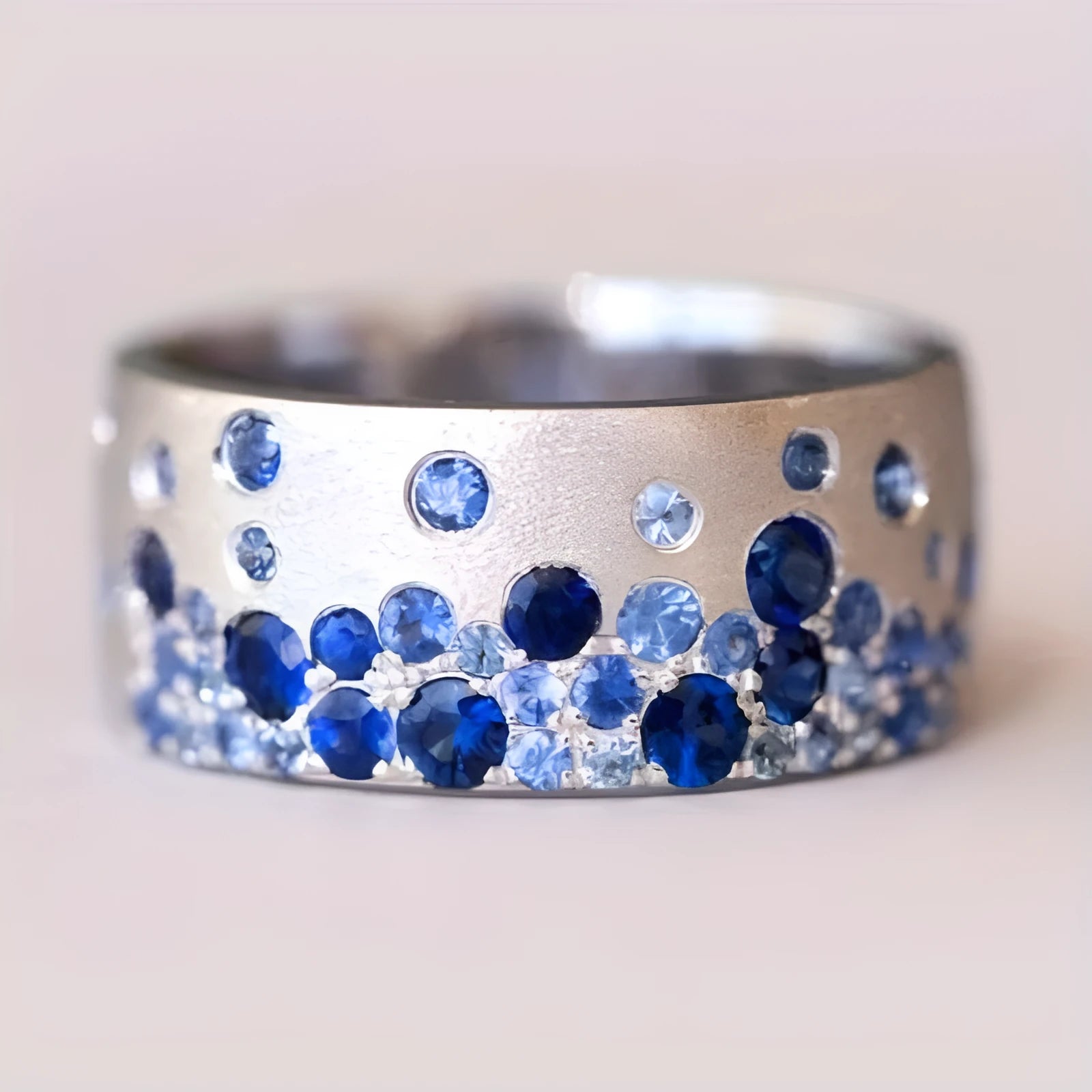 Mixed colour diamond retro personality ring in unisex geometric style on a white background.