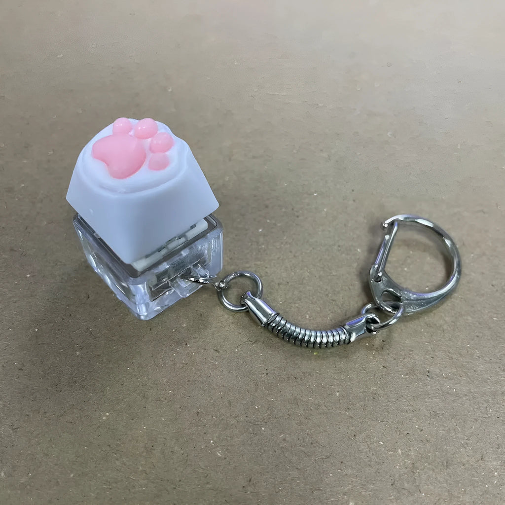 Decompression button keychain press sound toy with cat paw style, Type-C rechargeable, compact pendant design