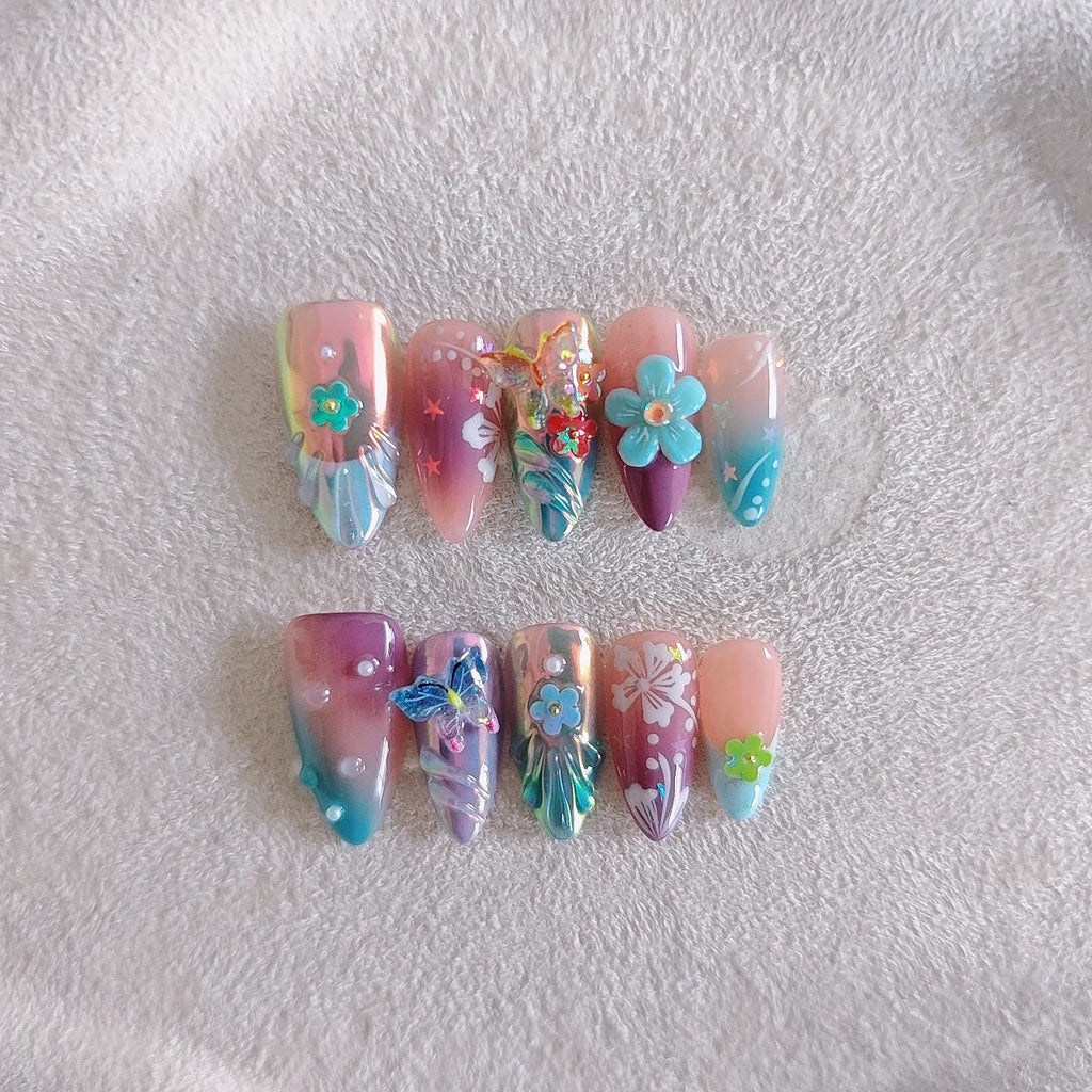Handmade floral and butterfly nail art sculptures in four sizes for 3D manicure decorations