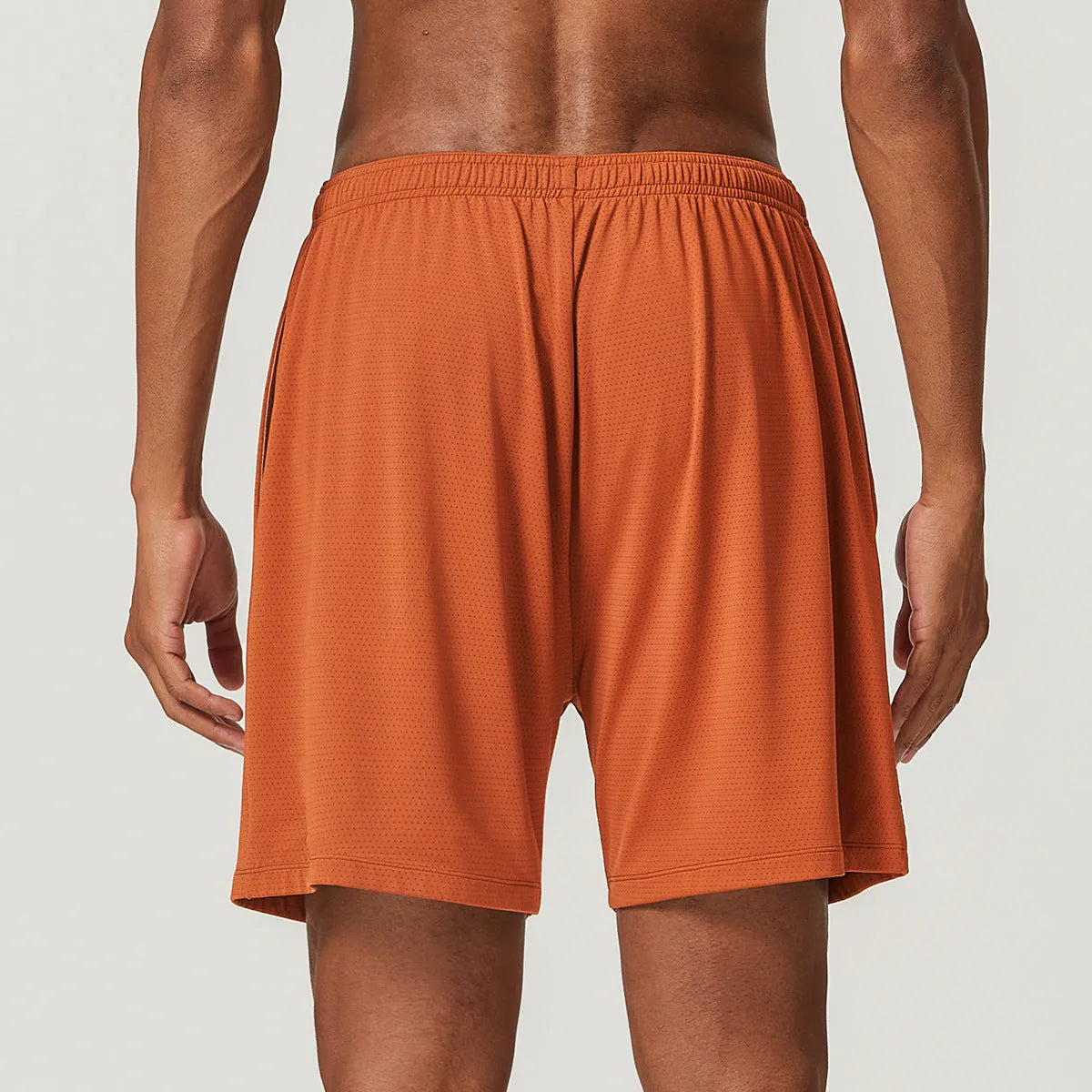 Men's sky green quick-dry running shorts with mid-waist and double-layer construction.
