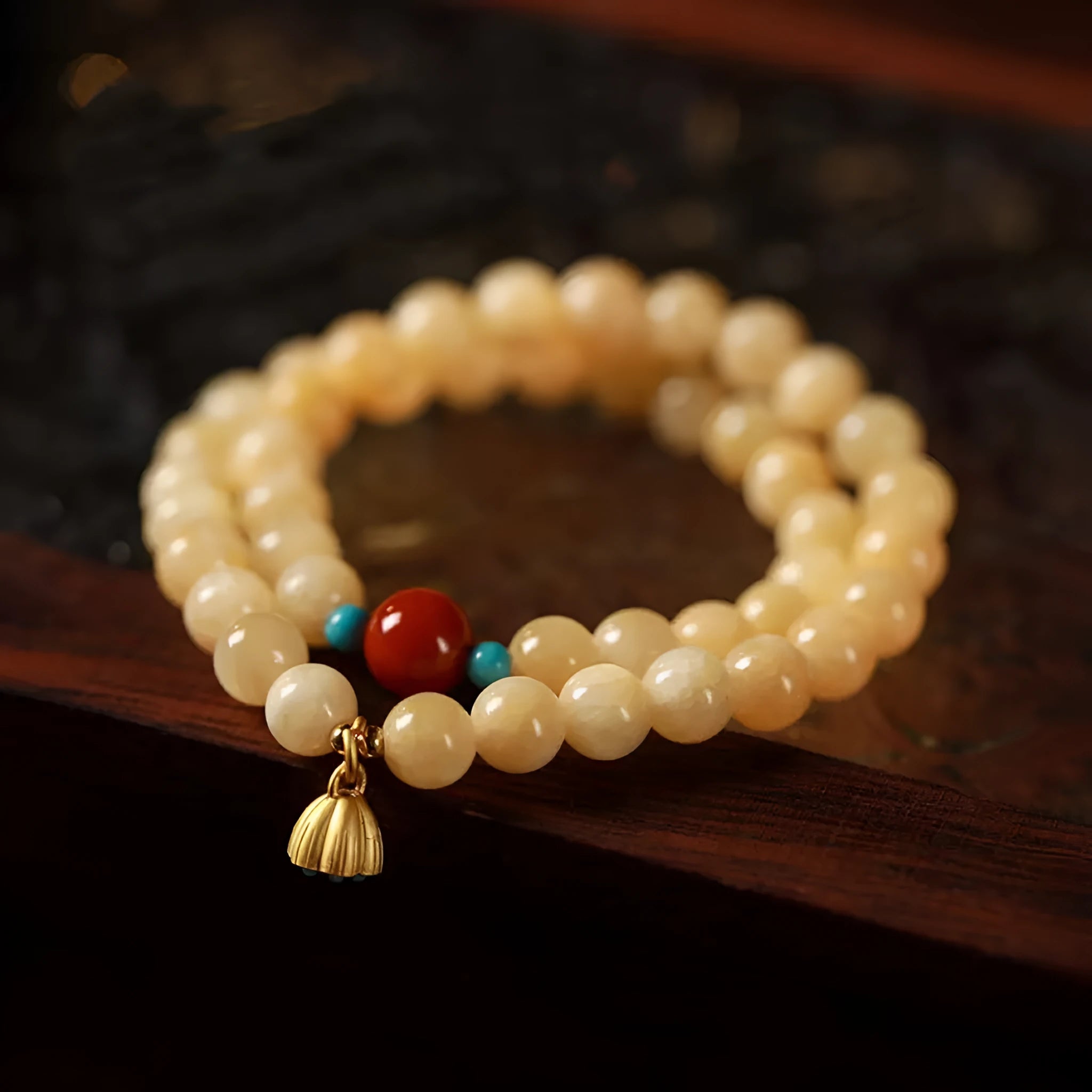 Handmade yellow jade bracelet with double ring design and lotus seedpod shapes