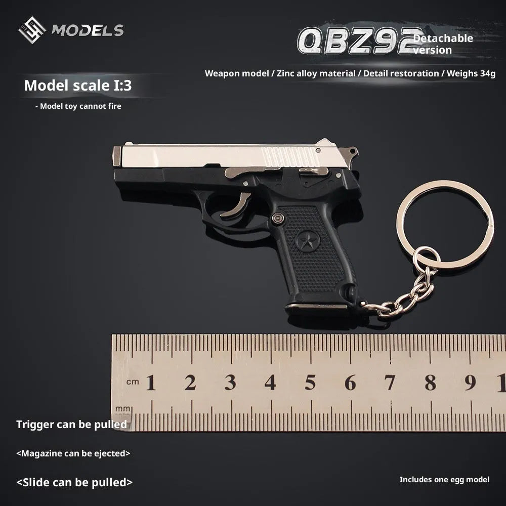 Semi-alloy disassembly grab model keychain pendant in black with geometric shape on key ring