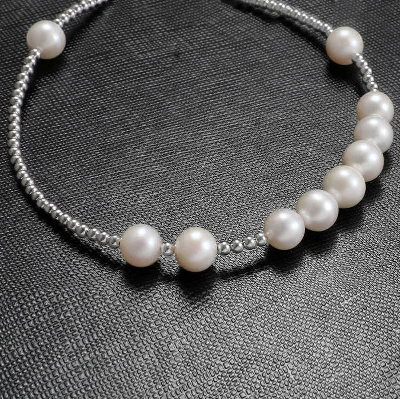 Unisex S925 sterling silver necklace with natural pearl and platinum-plated spacer bead on 51cm chain