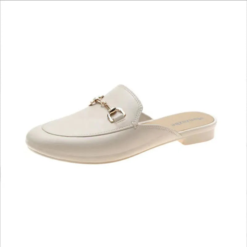 Women's PVC closed toe half slipper in black with a D buckle closure on a white background.