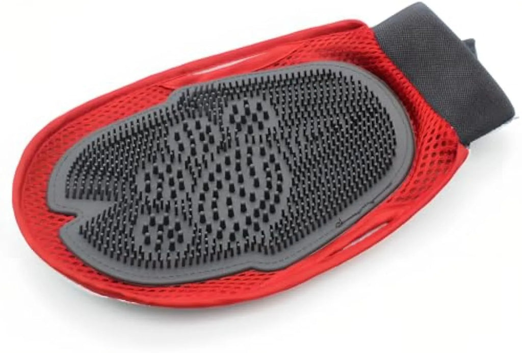 Red pet bathing glove combining a brush and grooming mitt for washing dogs or cats.