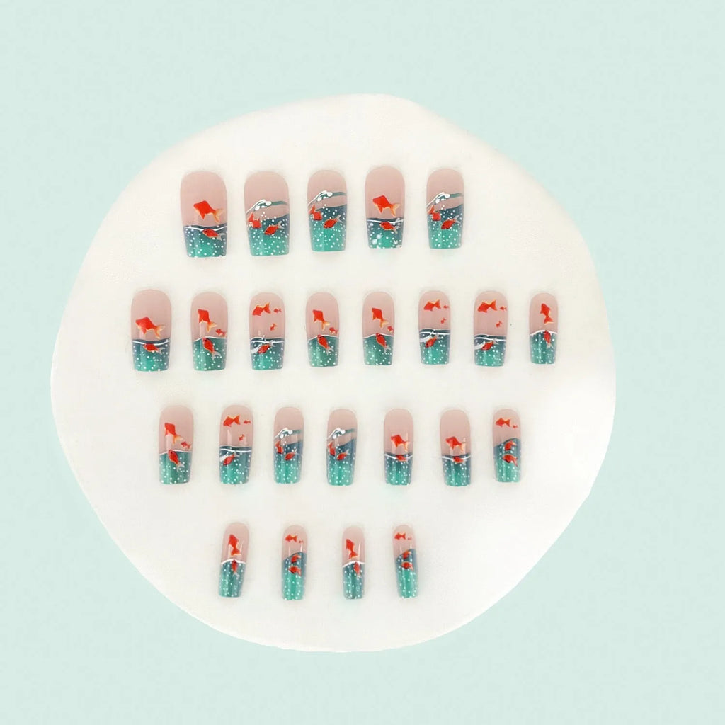 24-piece removable mid-square fake nail set with small goldfish pattern in Blue Glaze Jelly Glue style