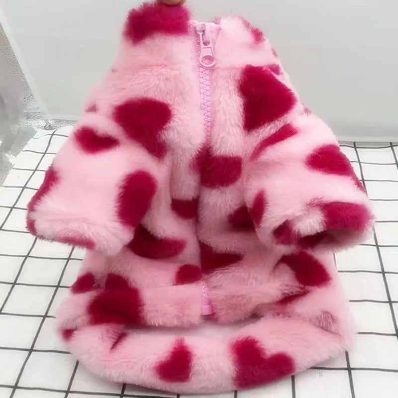 Small dog wearing pink polyester plush warm coat with British-style design