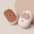 White rechargeable pet steam grooming brush for dogs and cats with rubber comb teeth