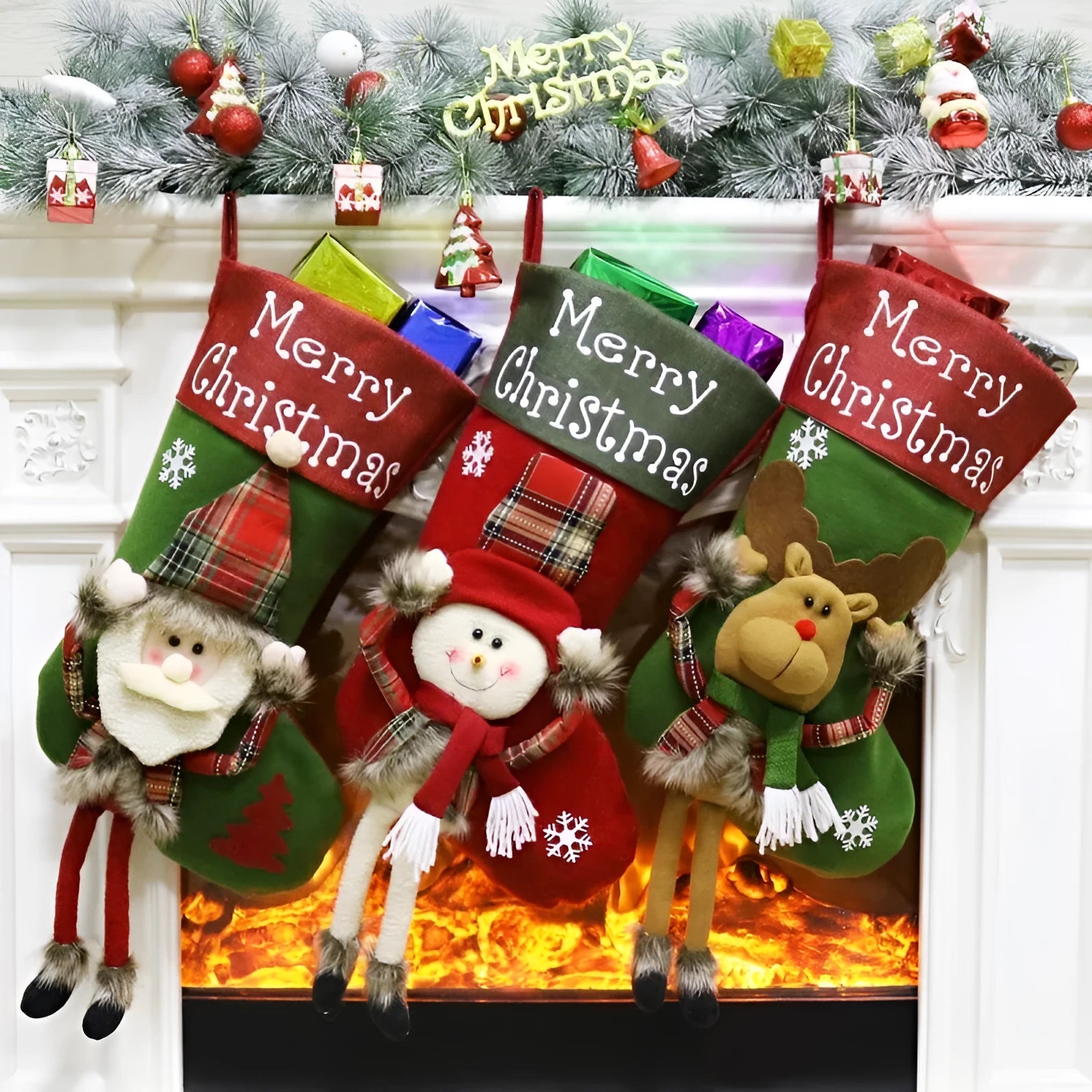Three large Christmas stockings with 3D Santa, snowman, and reindeer designs hung on tree