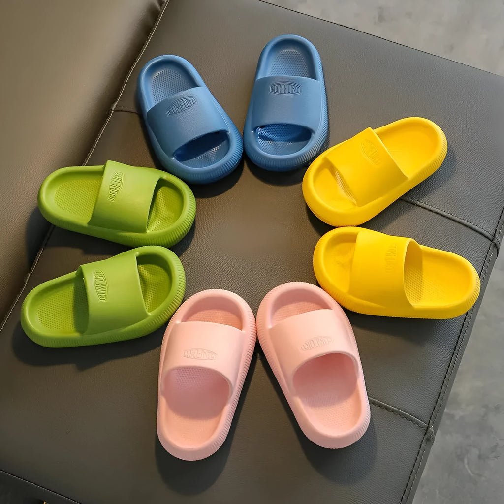 Children's mixed colour EVA slippers with a thick non-slip sole, shown in sizes for kids.