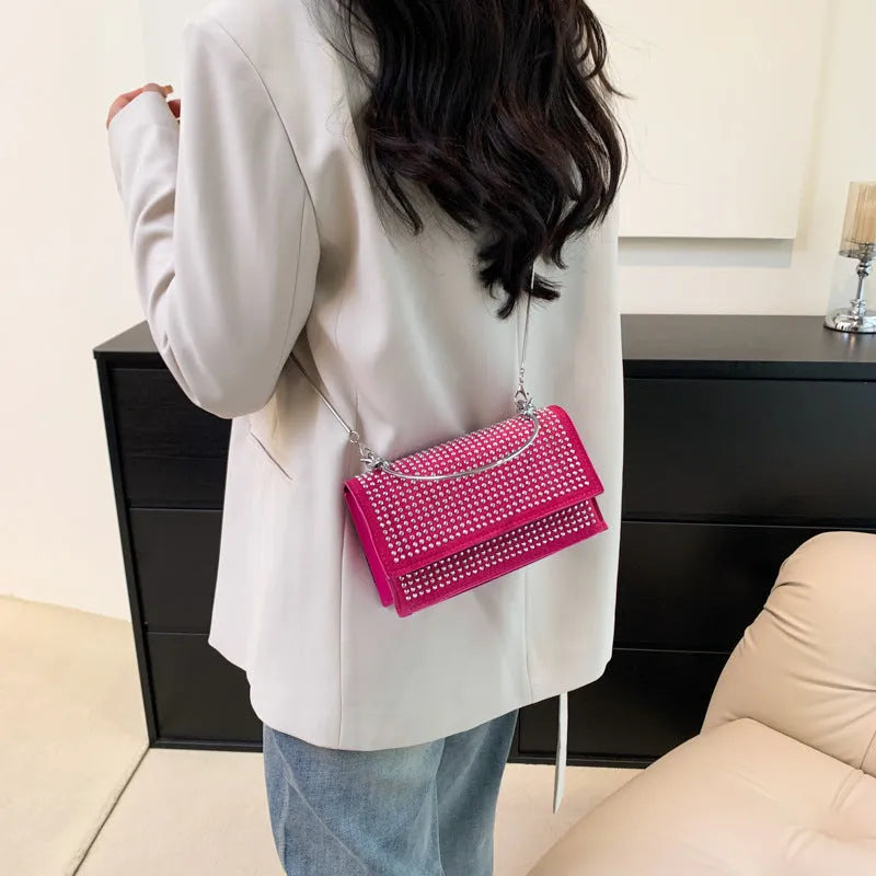 PU chain shoulder bag crossbody with synthetic leather lining, horizontal square shape, available in six colours.
