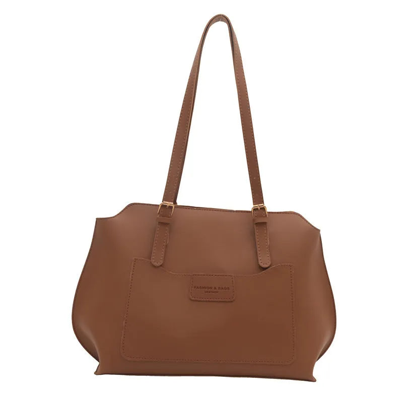 Women's structured PU tote bag in neutral colour with phone pocket and double shoulder straps.