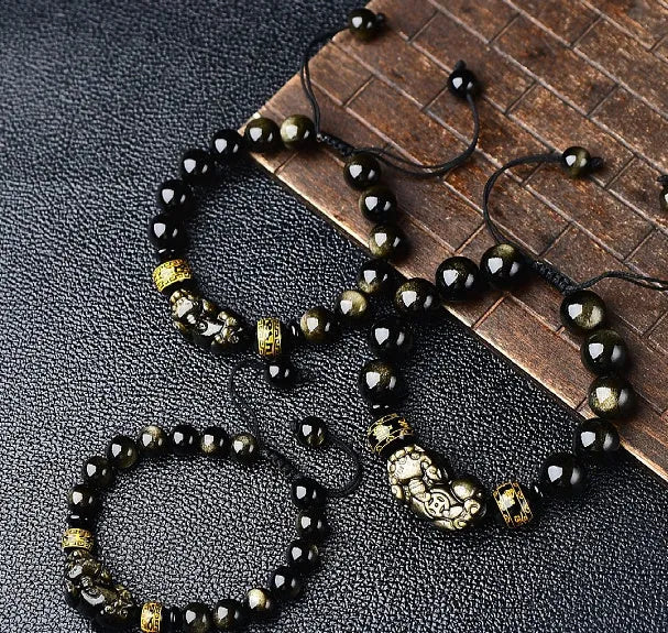 Hand-woven golden obsidian Pi Xiu bracelet with zodiac animal design in Chinese style