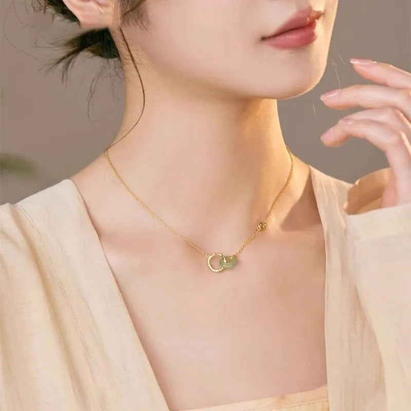 Sterling silver necklace with geometric bamboo peace buckle pendant and O-ring chain