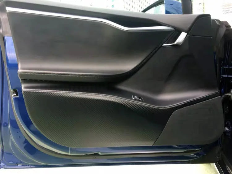 Clear carbon fibre protective film kit for Tesla Model S car door interior panels.