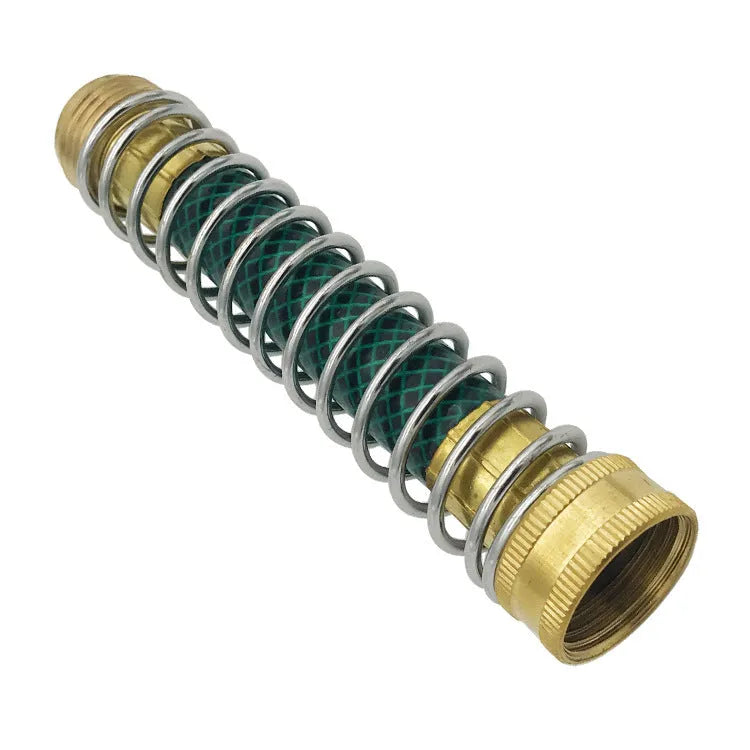 Close-up of a brass spring hose connector showing the spiral spring and 3/4 inch threaded fittings