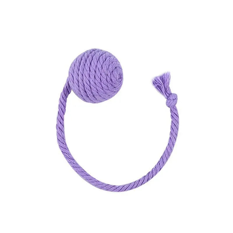 Colourful cat toy ball with attached rope and internal bell, shown in green, pink, purple, and yellow variants.