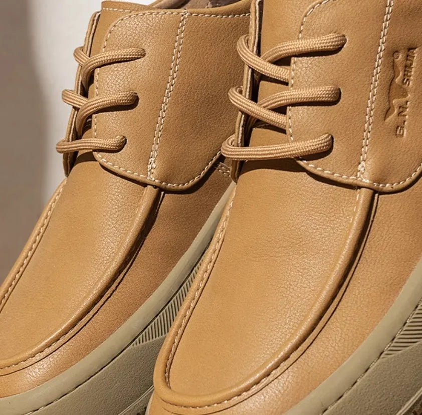 Men's brown retro-style leather casual shoes with a big toe design and visible stitching.