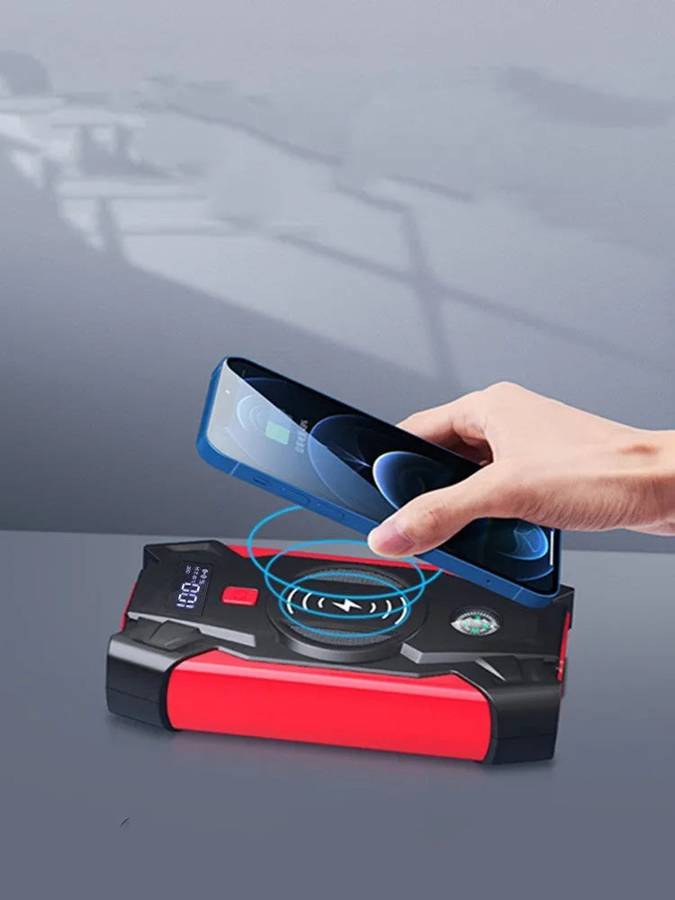 Red car jump starter power pack with digital display and thick battery clips