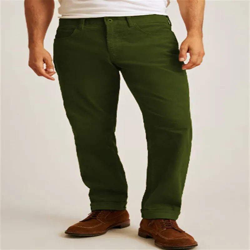 Men's straight leg corduroy trousers in a loose casual fit, shown in a solid colour with a mid-waist and zip fly detail.