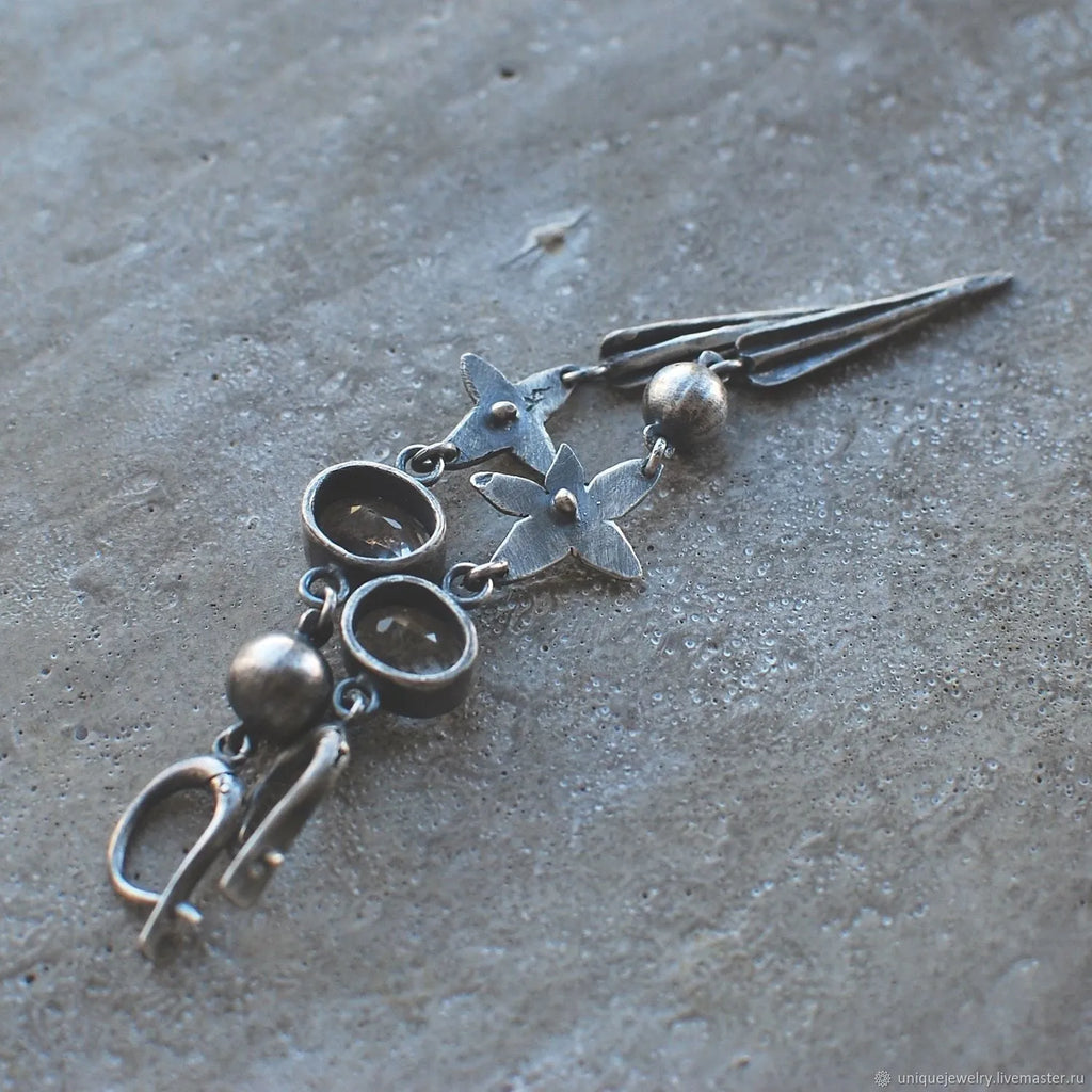 Geometric antique silver plated long pendant earrings with XINGX design and rhinestone detailing