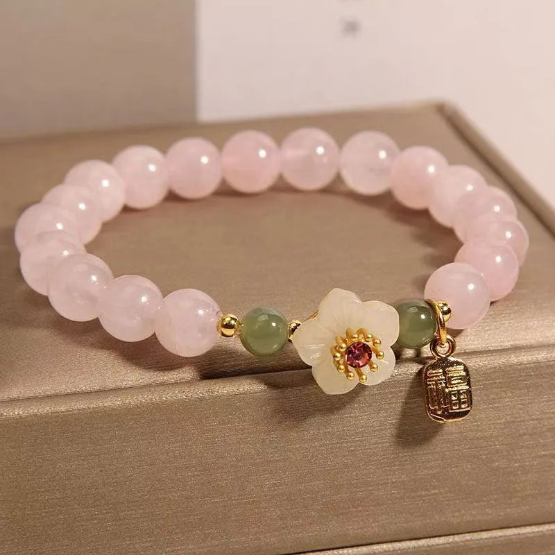 Women's crystal bracelet with peach blossom design and Hetian jade beads in blessing card colour