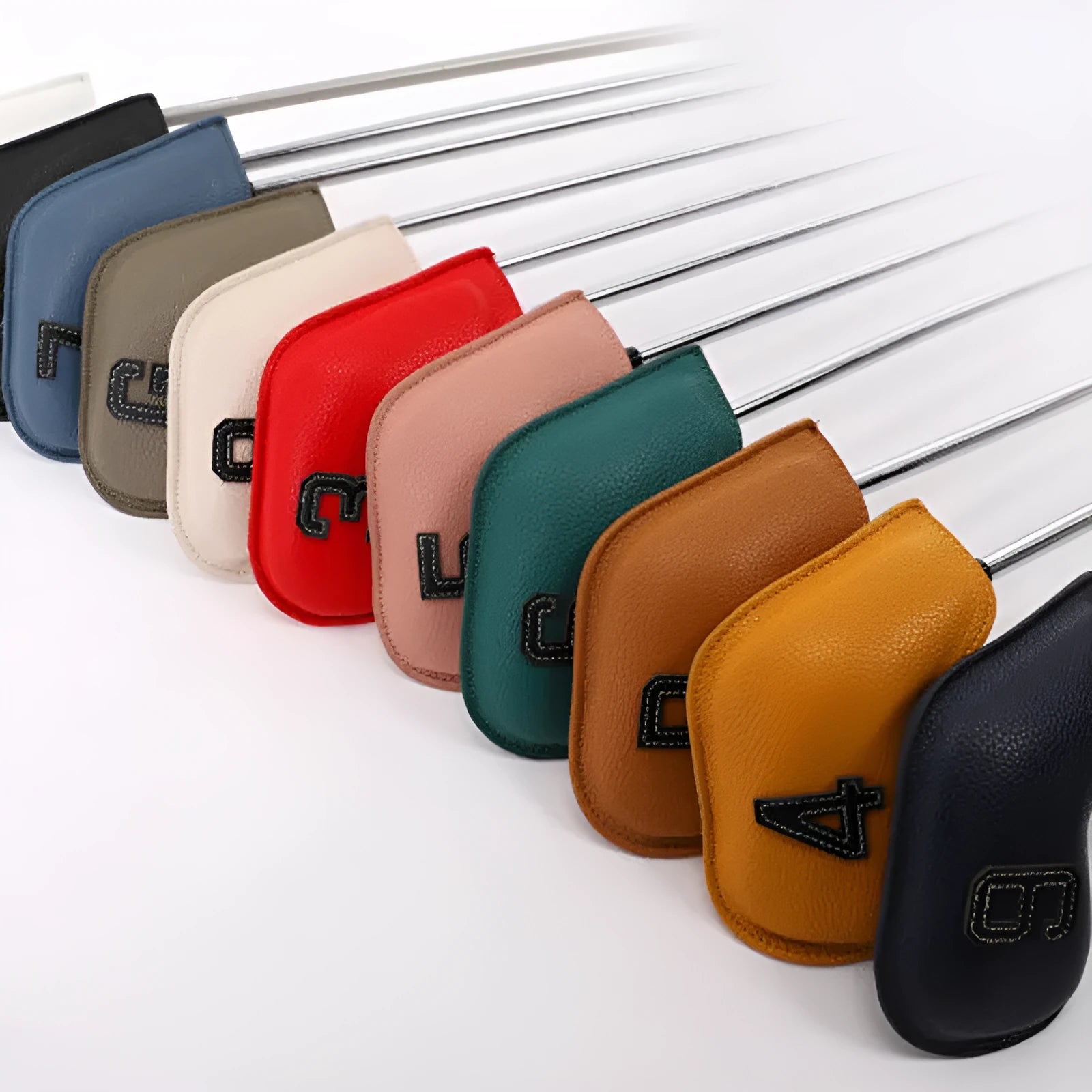 Set of 10 assorted colour PU golf club head covers with digital print designs.
