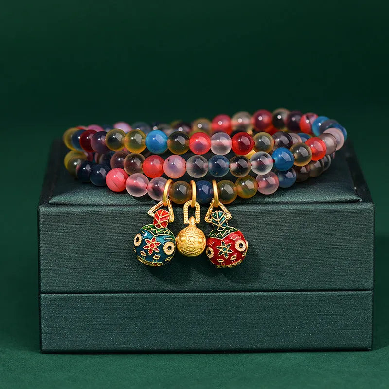 Dzogchen agate bracelet with gray glaze and gold beast decorative elements