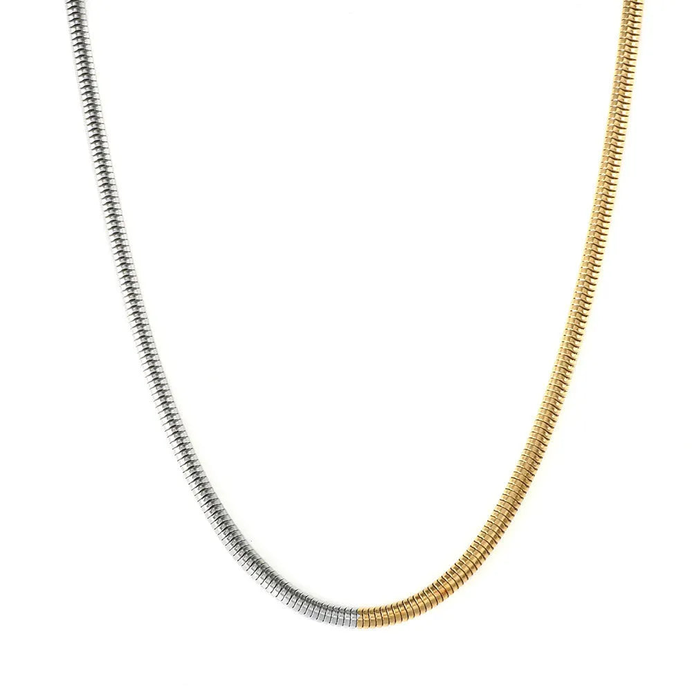 Gold-coloured stainless steel snake bone chain necklace with geometric design, 3mm width.