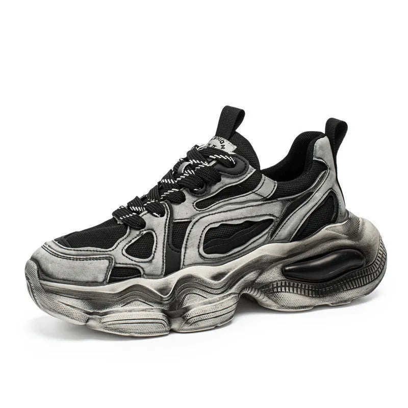 Men's black mesh casual sneakers with cross-strap detail and a platform rubber sole.