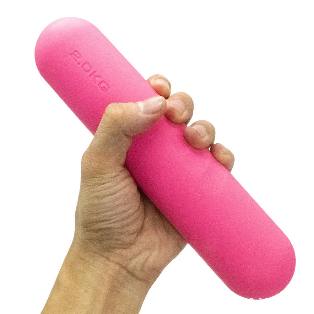 Silicone non-slip edging on a hand-drawn cast iron dumbbell stick in various colours and weights.