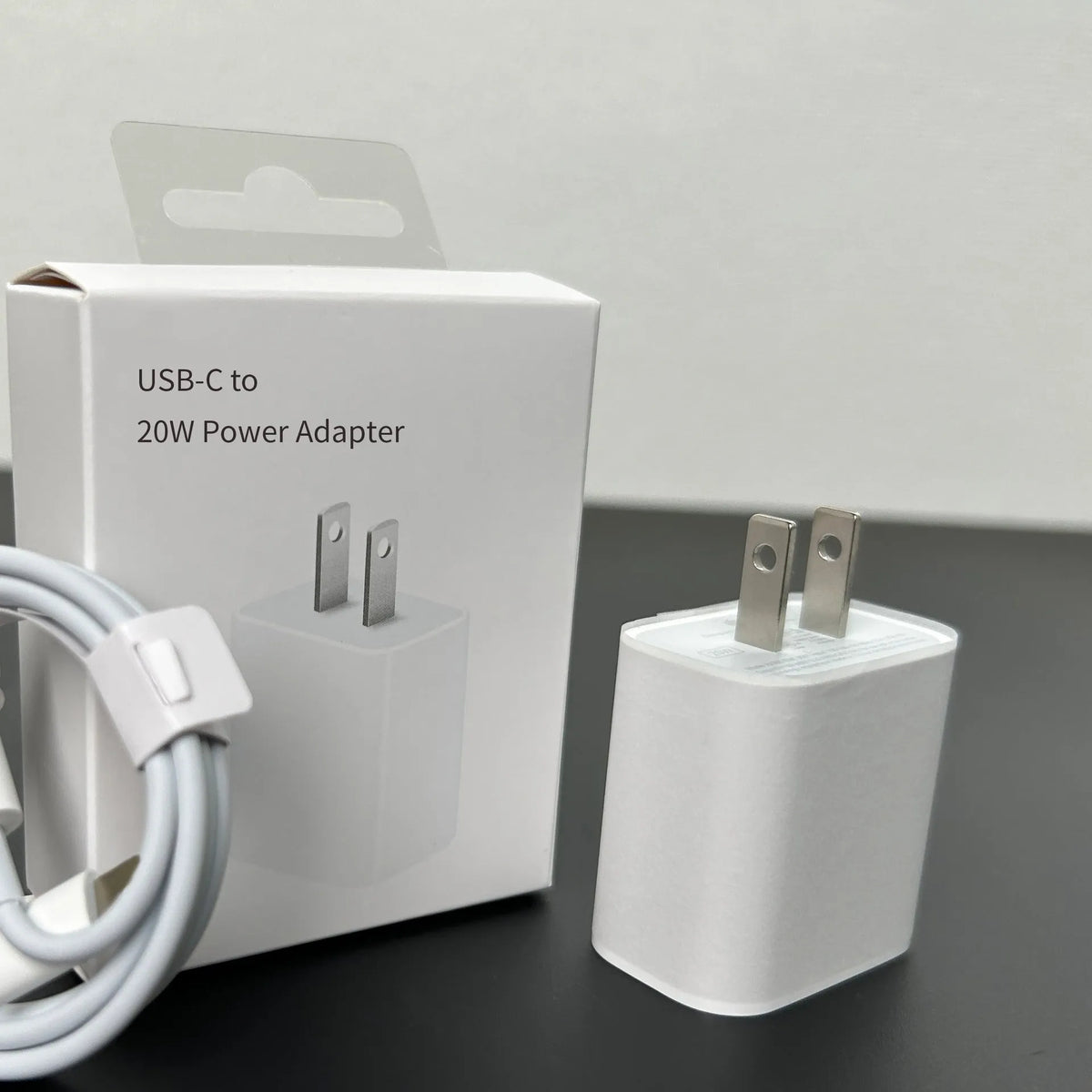 White 20W PD charger with Type-C interface showing international socket compatibility