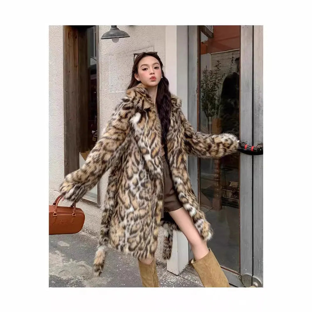 A women's long faux fur coat with a fur collar and pockets, shown in a street fashion style.