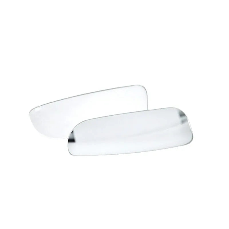 Glass adjustable blind spot mirror with angle bracket shown next to a vehicle rearview mirror.