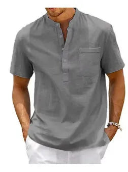 Men's solid colour short sleeve polo shirt with a stand collar, shown in a loose fit.