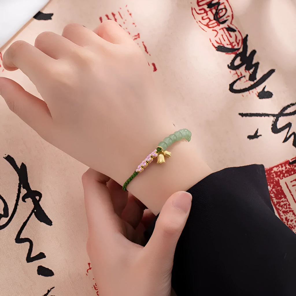 Red rope hand woven bracelet with lily carrying strap design in national style for women
