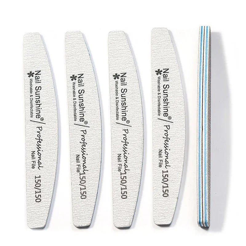 Grey half-moon shaped nail file with washable grit surface on a plain background.